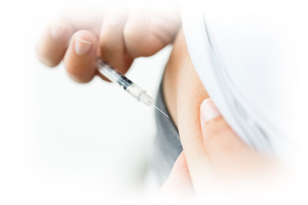 Woman with type 2 diabetes injecting insulin